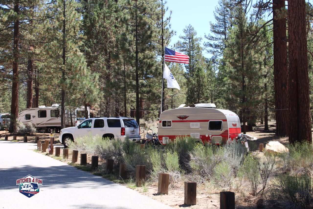 Retro Trailer and flag at Heart Bar Campground, Big Bear Lake, CA