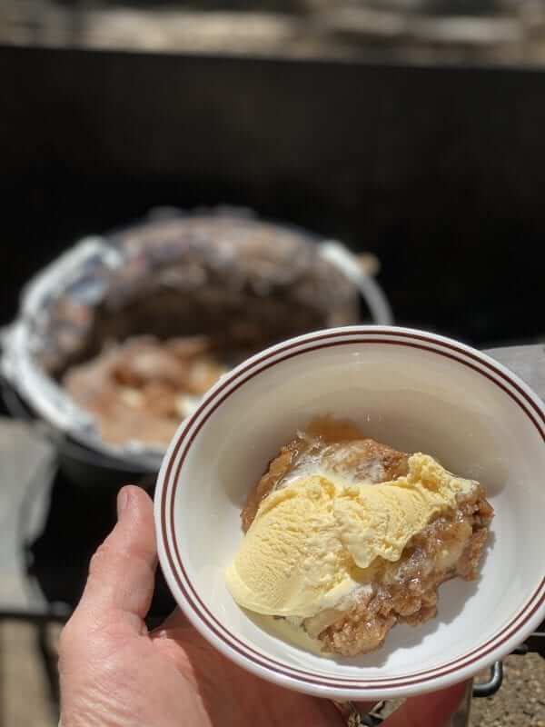 Bowl of Apple Spice Cobbler with Ice Cream.