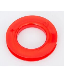 A close-up of the red plastic kite winder spool, included with the HQ DELTA RAINBOW CHECKER 2M kite.