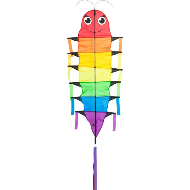 The rainbow-colored HQ Flapping Willie Worm kite flying in a blue sky with fluffy white clouds.