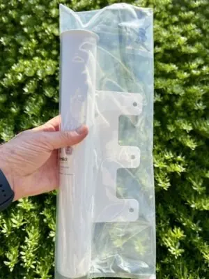 The complete RV Flag Pole Ramp Mount kit inside its protective clear retail packaging.