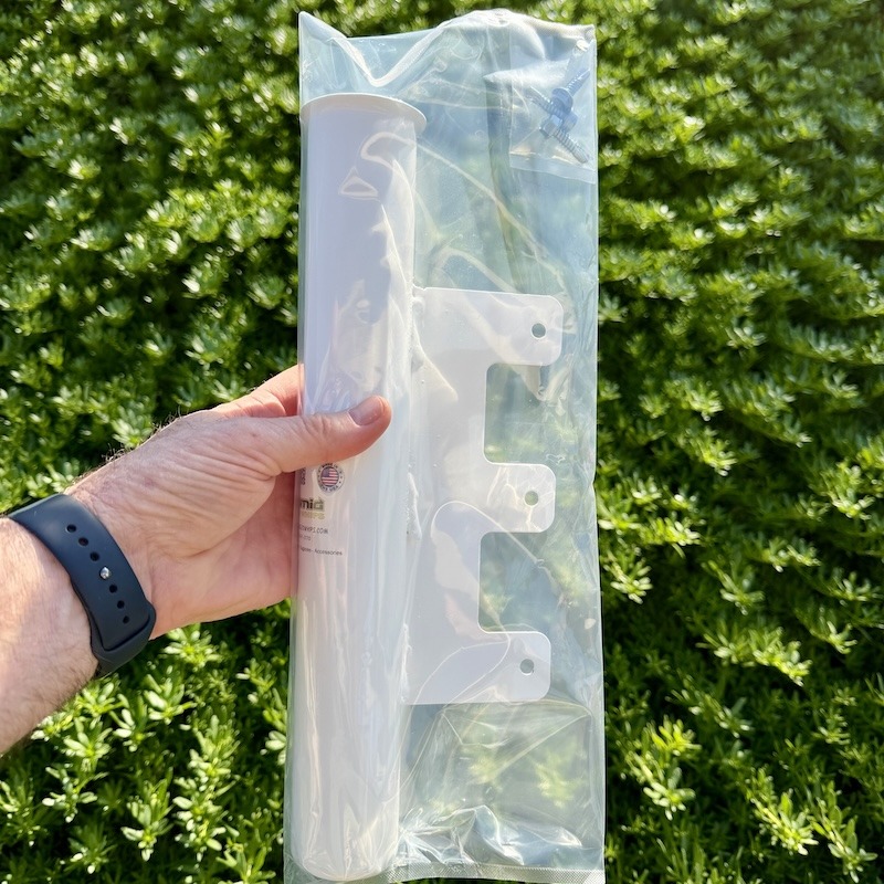 The complete RV Flag Pole Ramp Mount kit inside its protective clear retail packaging.